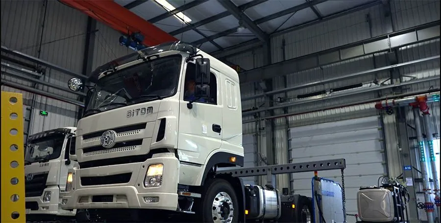 Automated manufacturing of grain truck components